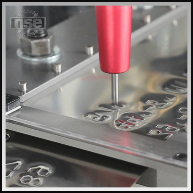 Automatic Tag Embossing System